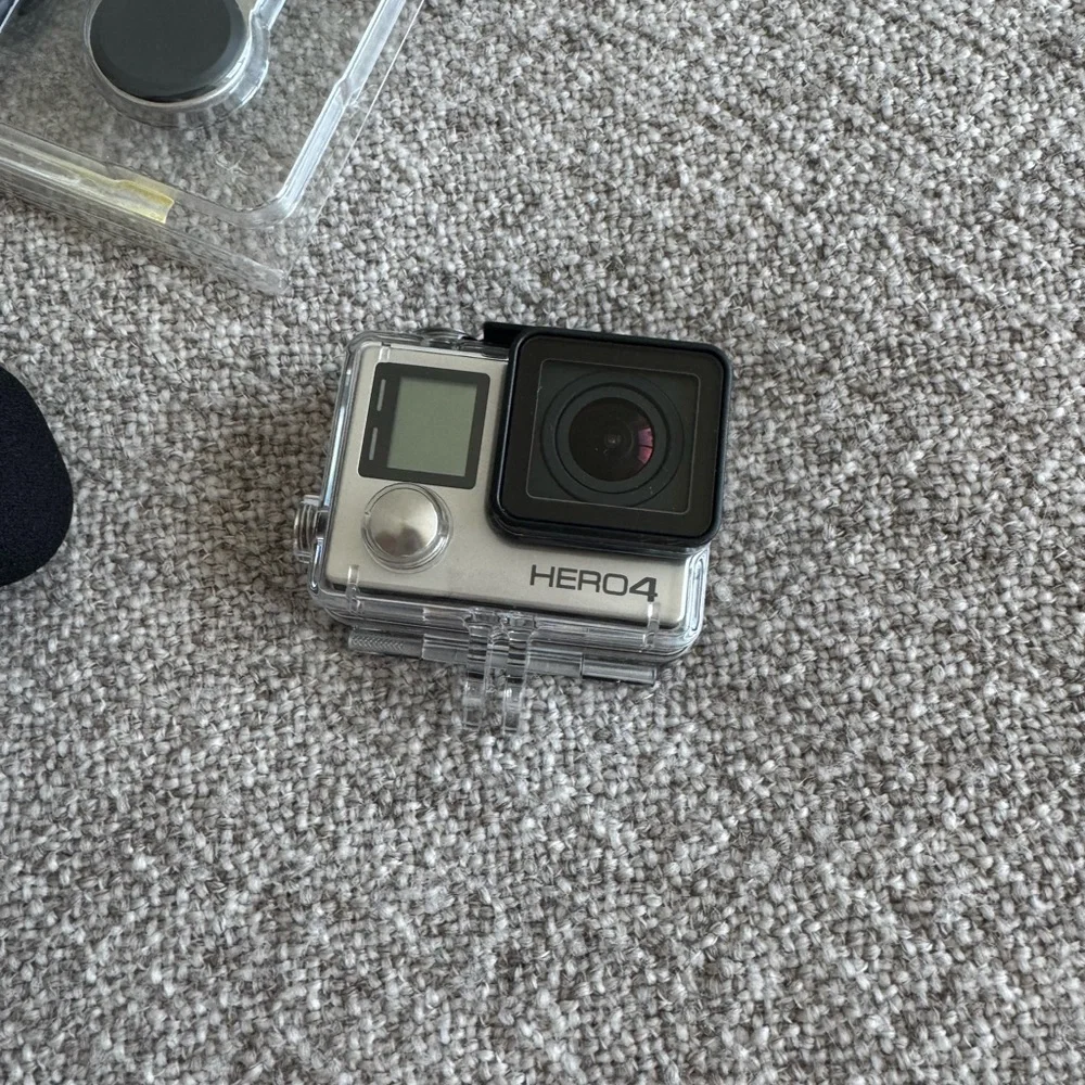 GoPro HERO4 Camera Bundle with Tripod+ GoPro case+ other accessories. NEW
